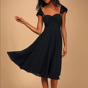 Black midi. Never worn
